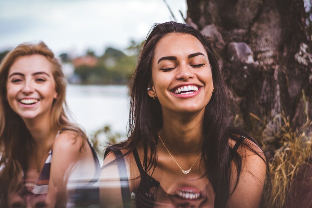 Woman smiling (women’s wellness)